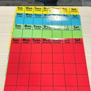 4 Colored Calendars! Laminated and in good condition still!